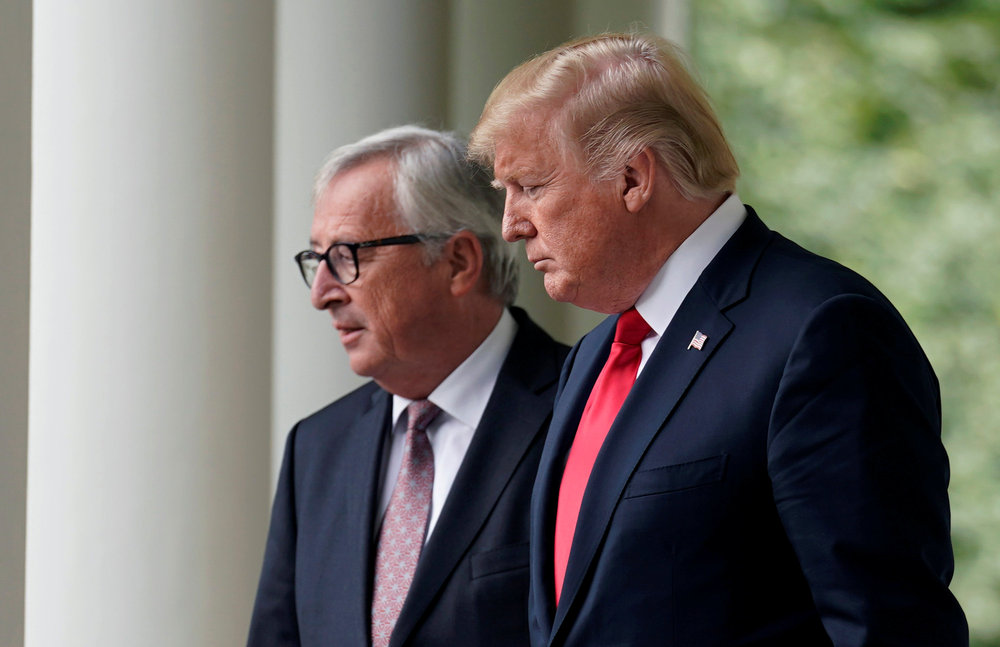 US President Donald Trump (right) and President of the European Commission Jean-Claude Juncker walk together before speaking about trade relations in the White House in Washington July 25, 2018. u00e2u20acu201d Reuters pic
