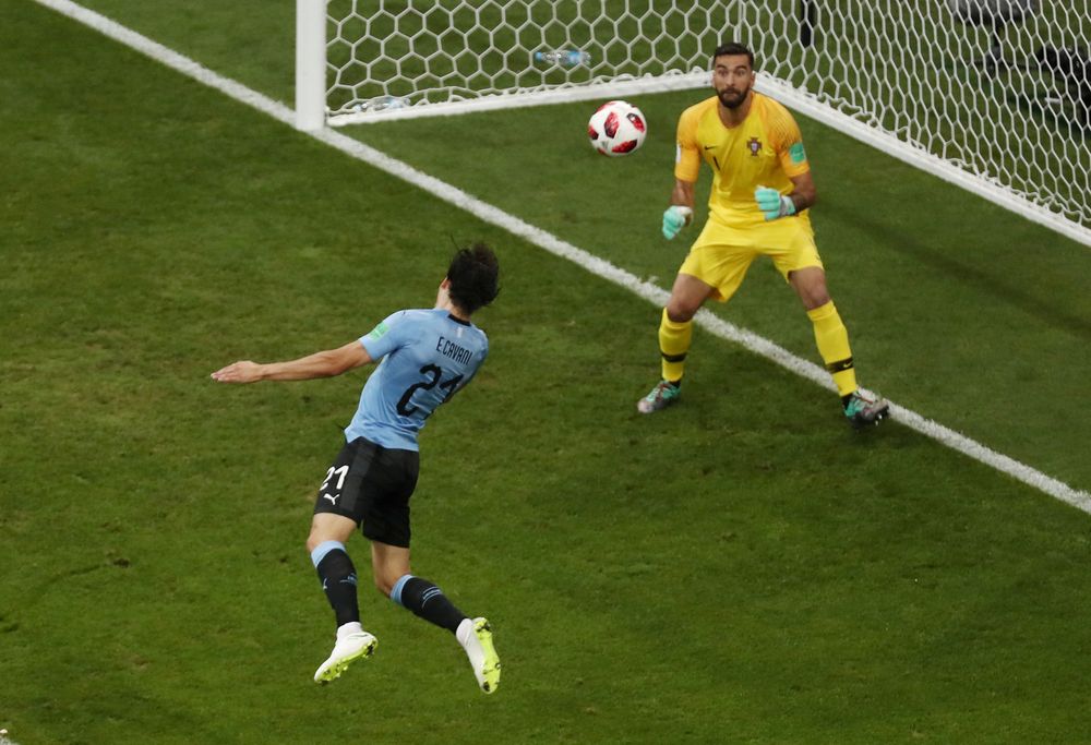 Uruguayu00e2u20acu2122s Edinson Cavani scores their first goal past Portugalu00e2u20acu2122s Rui Patricio during their World Cup Round of 16 match in Fisht Stadium, Sochi, Russia, June 30, 2018, u00e2u20acu201d Reuters pic