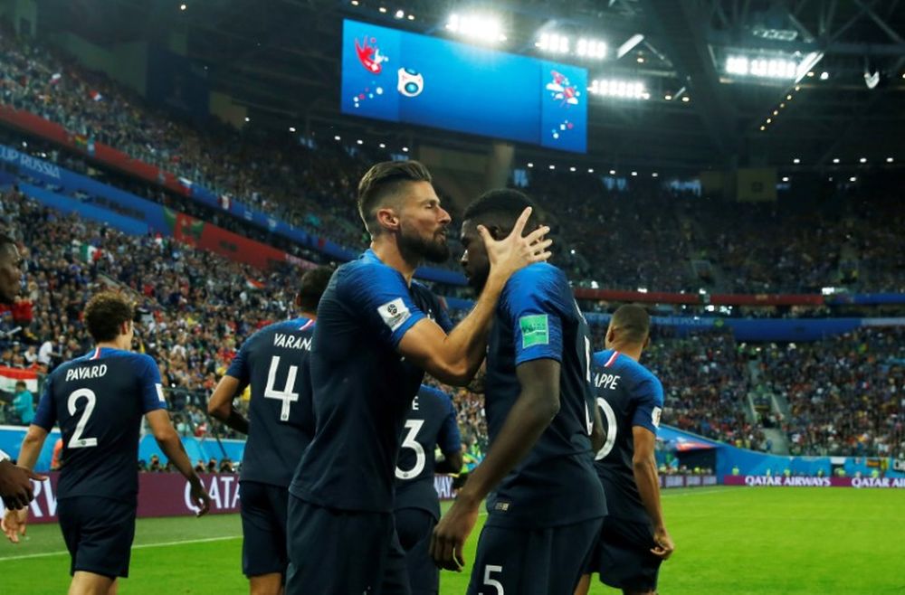 France's Samuel Umtiti celebrates with Olivier Giroud after scoring the first goal against Belgium July 11, 2018. u00e2u20acu2022 Reuters pic
