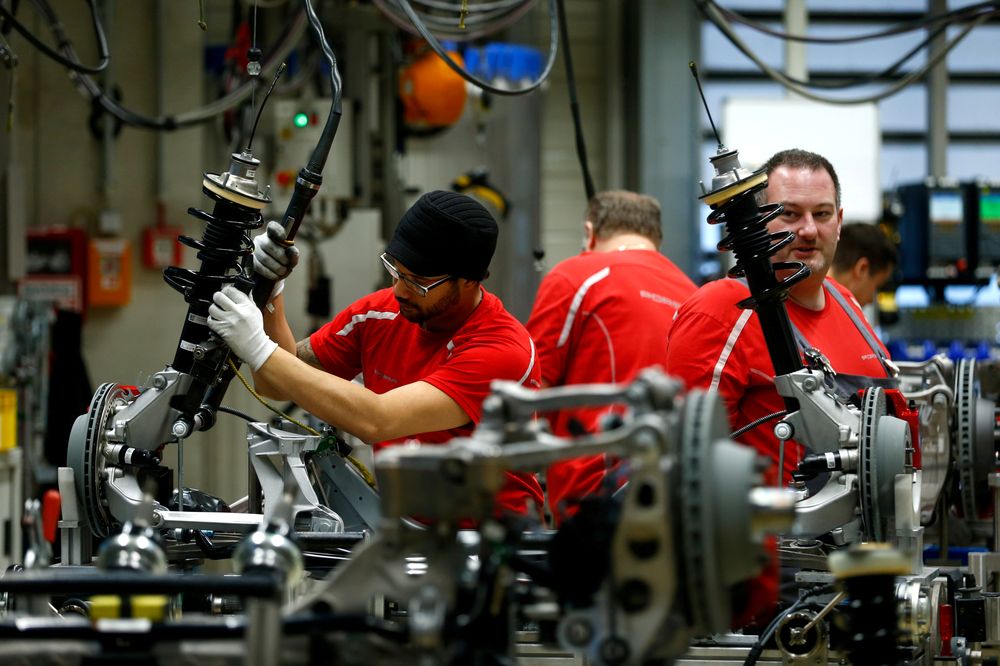Employees of German car manufacturer Porsche work chassis at the Porsche factory in Stuttgart-Zuffenhausen, Germany, January 26, 2018. u00e2u20acu201d Reuters pic