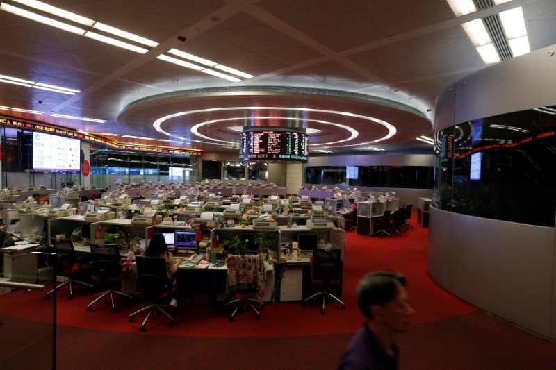 A floor trader walks during afternoon trading at the Hong Kong Stock Exchange September 26, 2016. u00e2u20acu201d Reuters pic