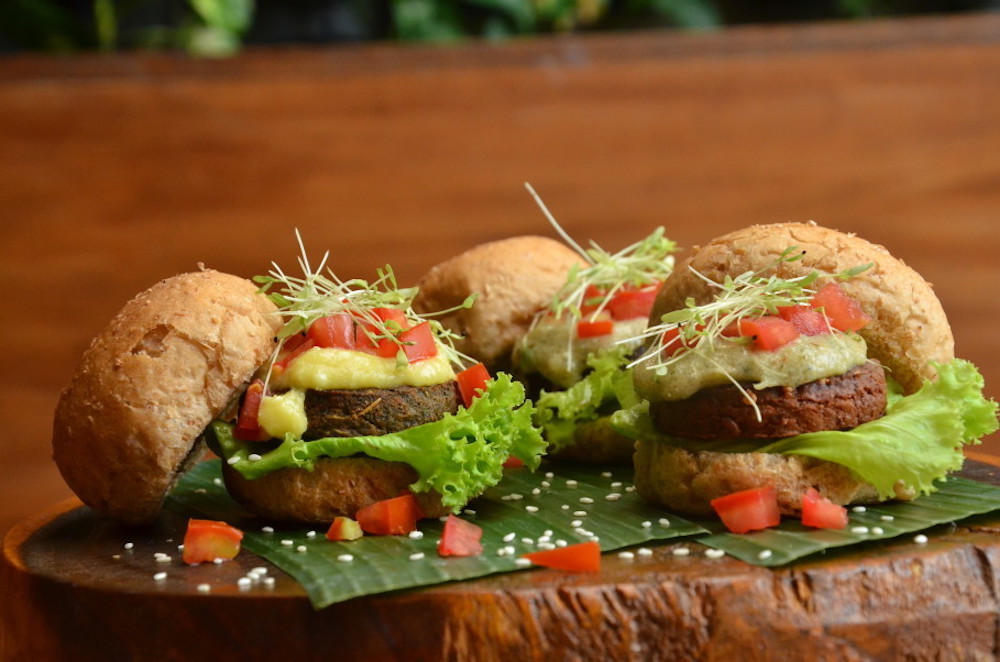 Burgreens’ vegetarian burger trio features three different kinds of patties, two kinds of sauces and wholewheat buns. — Jakarta Globe pic