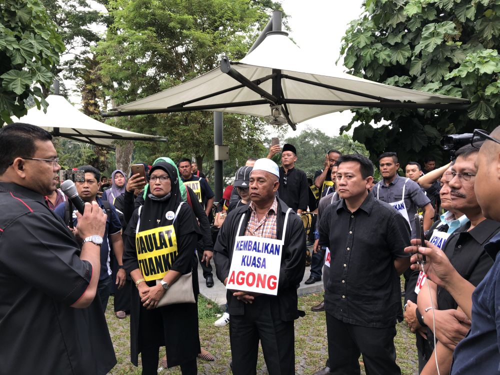 Datuk Lokman Noor Adam briefing the crowd as they prepare to march to Parliament, July 17, 2018. u00e2u20acu2022 Picture by Emmanuel Santa Maria Chin