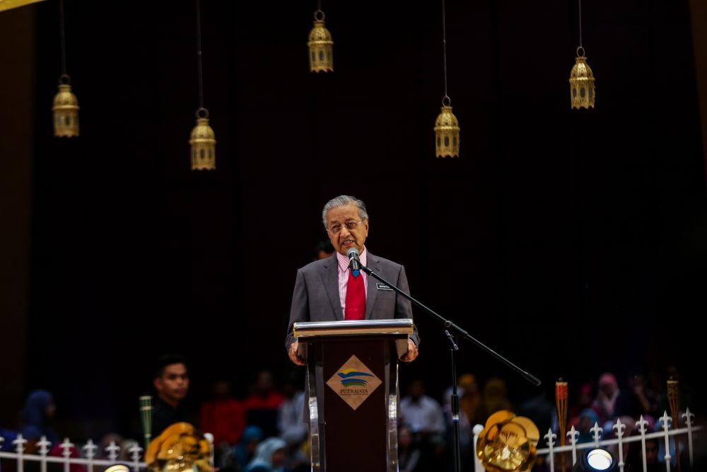 Tun Dr Mahathir Mohamad gives a speech at the Prime Ministeru00e2u20acu2122s Department Hari Raya celebration in Putrajaya July 4,2018. u00e2u20acu2022 Picture by Ahmad Zamzahuri