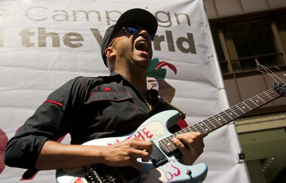 Former Rage Against the Machine guitarist Tom Morello performs at the National Nurses United rally in Chicago May 18, 2012. u00e2u20acu201d AFP pic