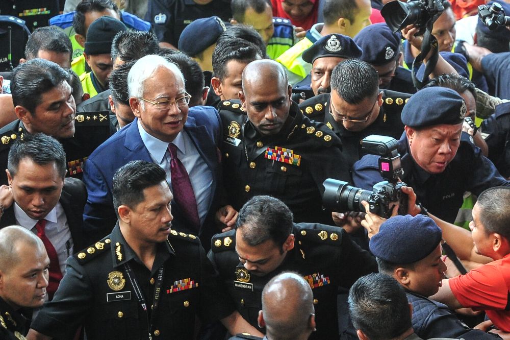 Datuk Seri Najib Razak arrives at the Kuala Lumpur High Court, July 4, 2018.  u00e2u20acu2022 Picture by Shafwan Zaidon