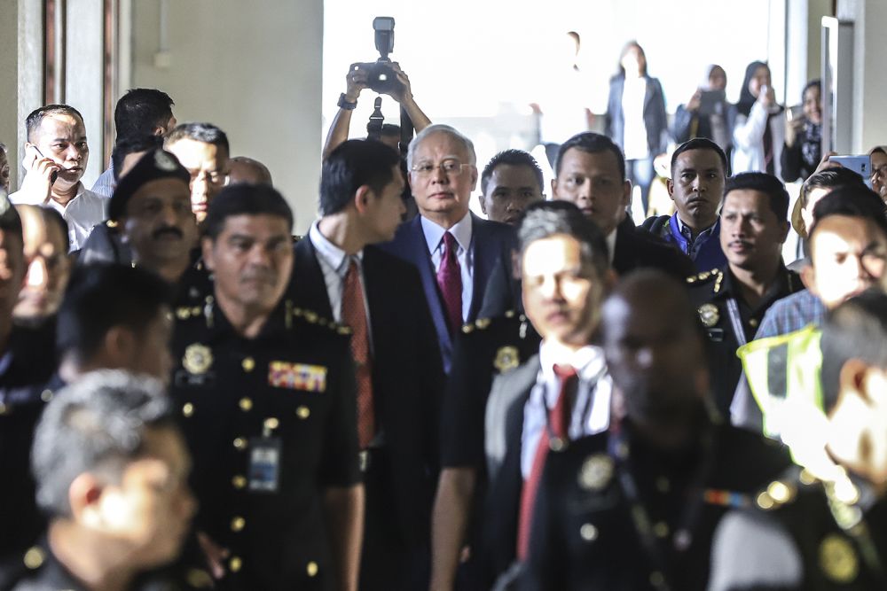 Datuk Seri Najib Razak arrives at the Kuala Lumpur High Court, July 4, 2018.  u00e2u20acu2022 Picture by Azneal Ishak 