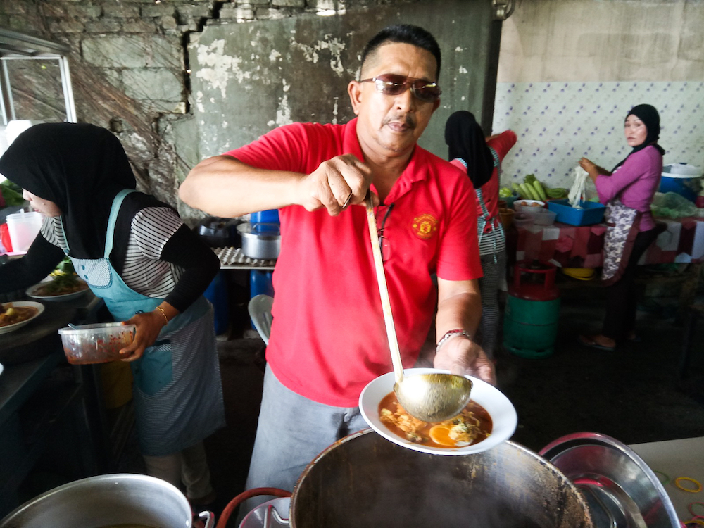 Pak Chop got the recipe for his famous u00e2u20acu02dcmee rebusu00e2u20acu2122 from a popular stall back in Kedah years ago. u00e2u20acu201d Picture by R. Rohaizam