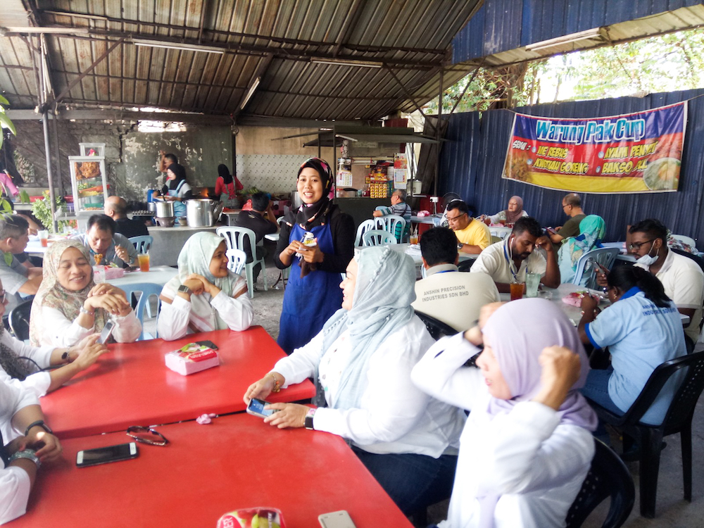 A typical scene at Pak Chop’s stall every lunchtime. — Picture by R. Rohaizam