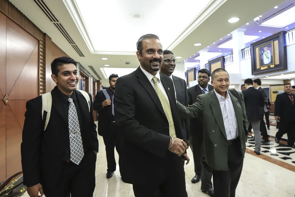 Ramkarpal Singh (centre) is pictured at Parliament July 18, 2018. u00e2u20acu201d Picture by Azneal Ishak