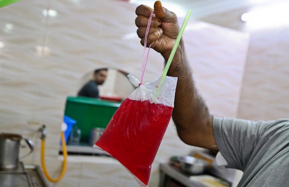 Drinks are sold in a plastic bag at an eatery in George Town July 4, 2018. u00e2u20acu201d Picture by Sayuti Zainudin