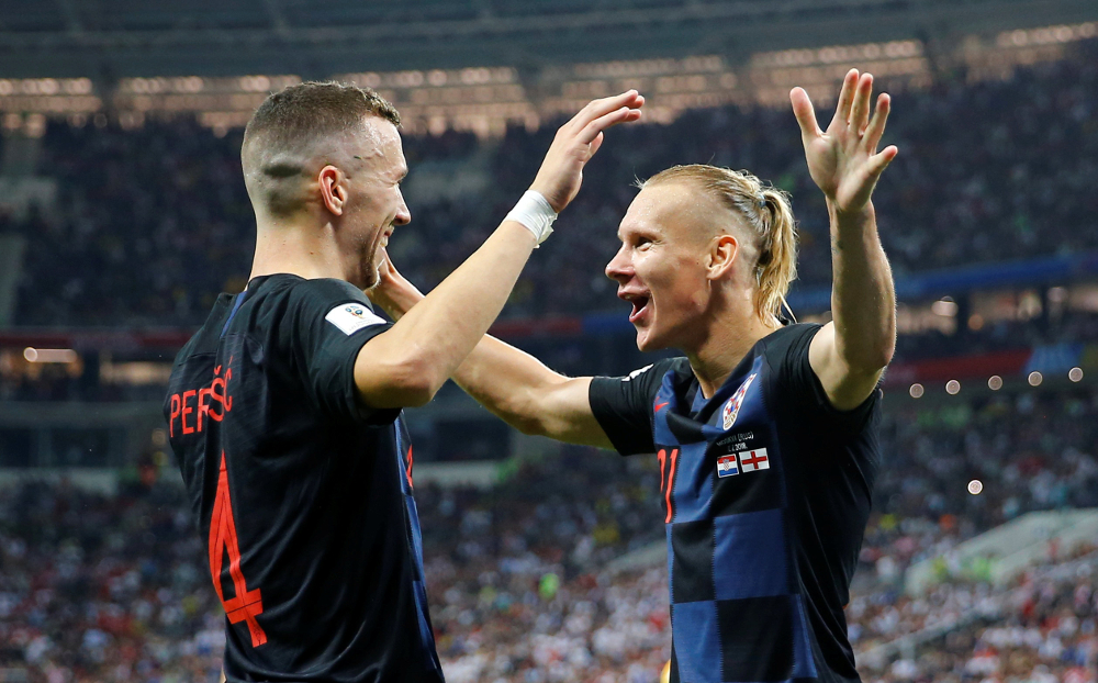 Croatiau00e2u20acu2122s Ivan Perisic celebrates scoring their first goal with Domagoj Vida during their World Cup Semi Final against England at Luzhniki Stadium, Moscow July 11, 2018. u00e2u20acu201d Reuters pic