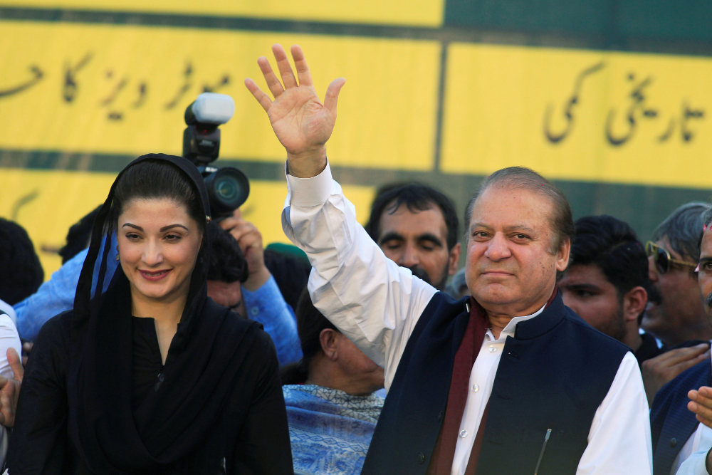 Former Pakistan prime minister and leader of Pakistan Muslim League Nawaz Sharif (right) gestures to supporters as his daughter Maryam Nawaz looks on during partyu00e2u20acu2122s workers convention in Islamabad June 4, 2018. u00e2u20acu201d Reuters pic