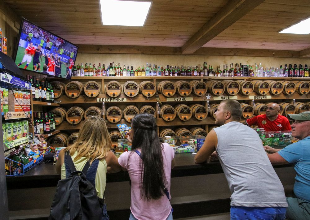 People watch the broadcast of the World Cup quarter-final match between Russia and Croatia in a bar in Yevpatoria, Crimea, July 7, 2018. u00e2u20acu201d Reuters pic