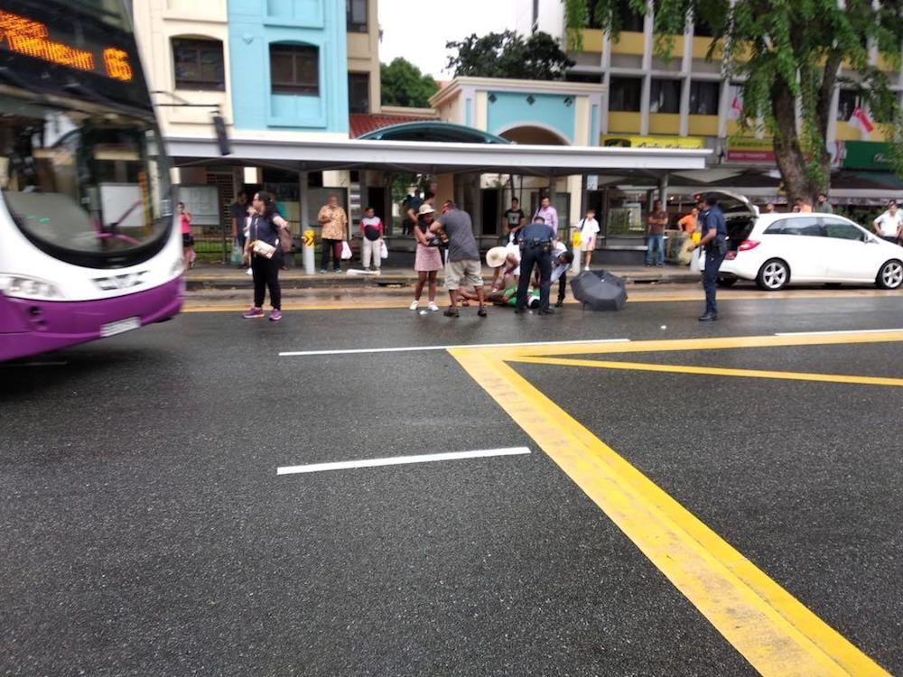 Police investigators work at scene where a man was attack by four others with a kitchen knife and a samurai sword at 202 Serangoon Road on the afternoon of July 25, 2018. u00e2u20acu201d TODAY pic