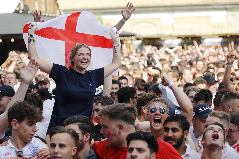England fans celebrate as England score their second goal, as they watch the Russia 2018 World Cup quarter-final football match between Sweden and England on a big screen in London on July 7, 2018.nu00e2u20acu201d AFP pic 