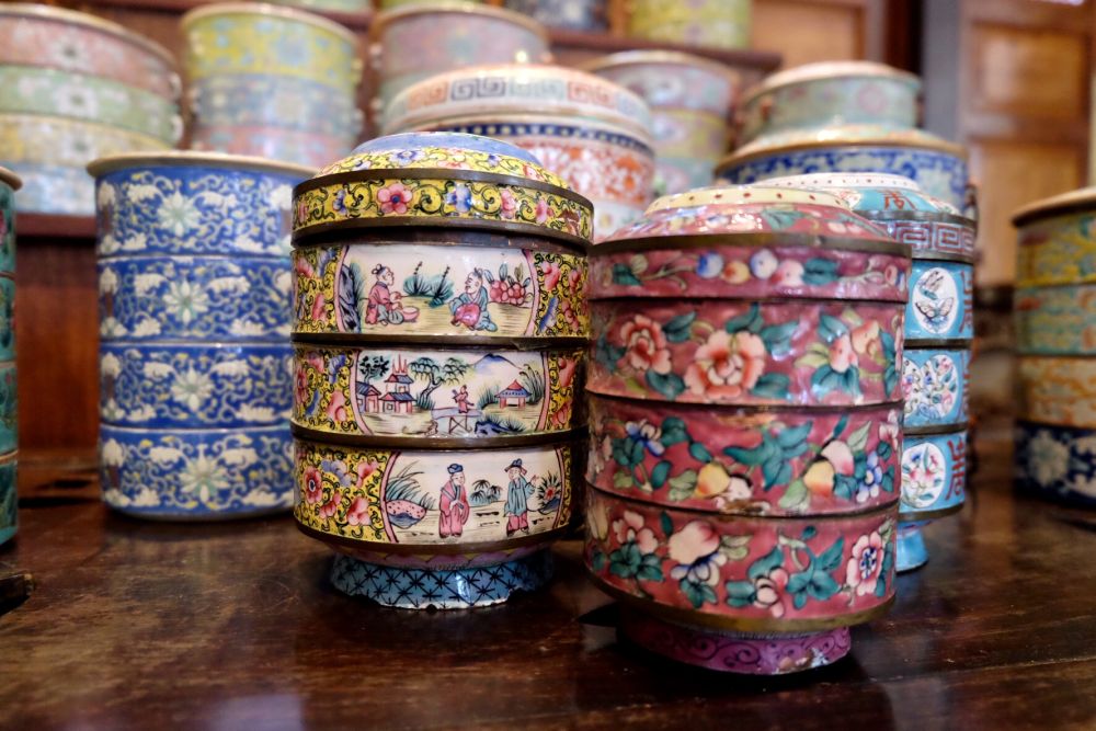 The colourful porcelain tingkat was used to serve food to different quarters in a large communal household.