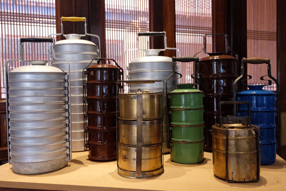 Metal tiffin carriers that were used including those used in India and those used by Chinese households but were made in Eastern Europe.