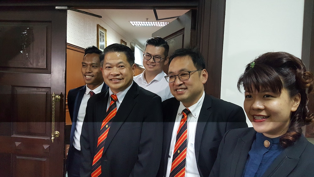 Dr Ting Tiong Choon (left) with Sarawak DAP chairman Chong Chieng Jen after the Court of Appeal gave its ruling in Kuching July 13, 2018. u00e2u20acu201d Picture by Sulok Tawie
