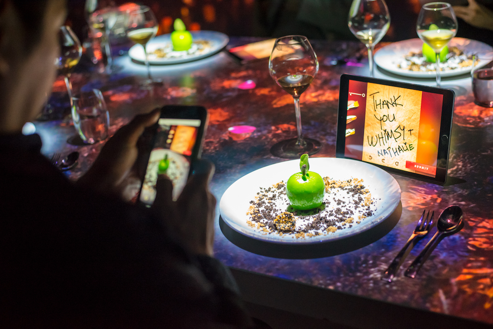 The Make-A-Wish — Perfect Apple dessert, where diners also have the chance to write messages on iPads that float around the room on virtual lanterns.