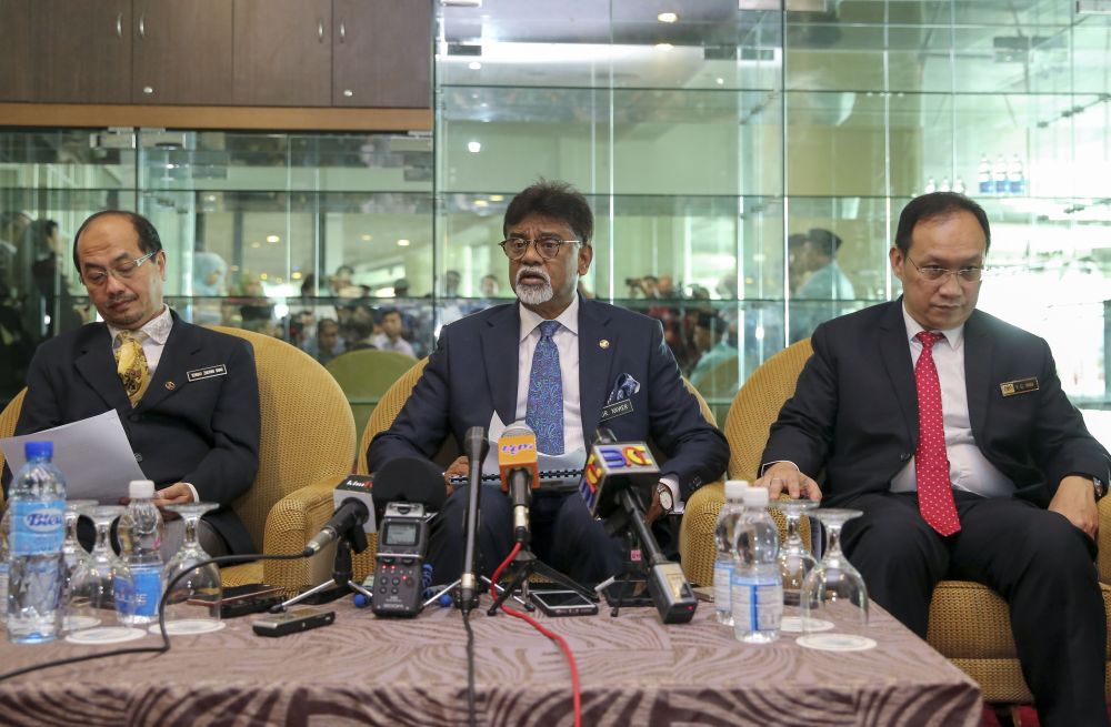 Dr Xavier Jayakumar (centre) speaks during a press conference after attending the National Land Celebration Day 2018 in Kuala Lumpur July 27, 2018. u00e2u20acu2022 Picture by Yusof Mat Isa