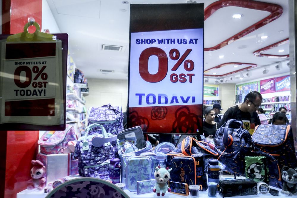 A zero-rated GST signboard is seen in a shop at the Suria KLCC shopping centre in Kuala Lumpur July 18, 2018. u00e2u20acu201d Picture by Hari Anggara
