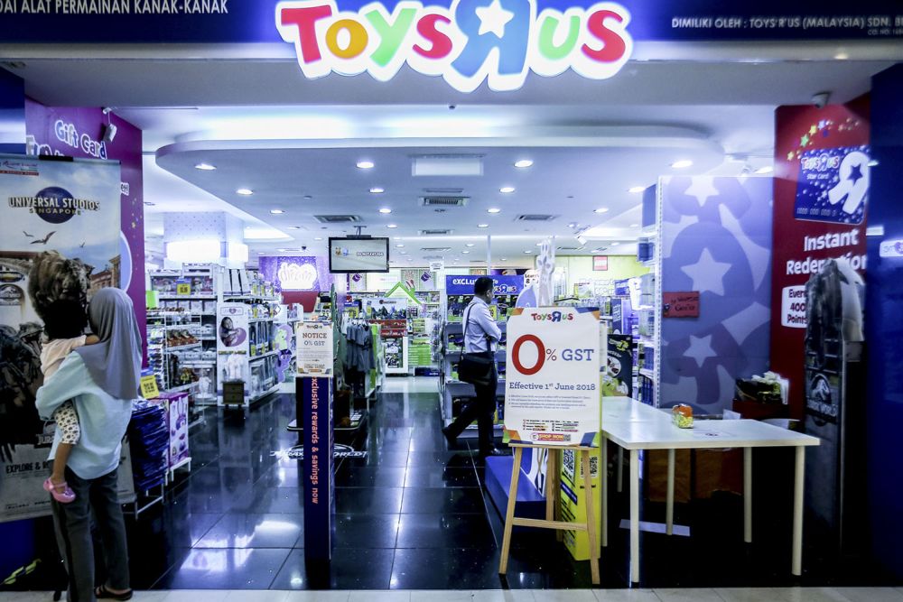 A zero-rated GST signboard is seen in a shop at the Suria KLCC shopping centre in Kuala Lumpur July 18, 2018. u00e2u20acu201d Picture by Hari Anggara