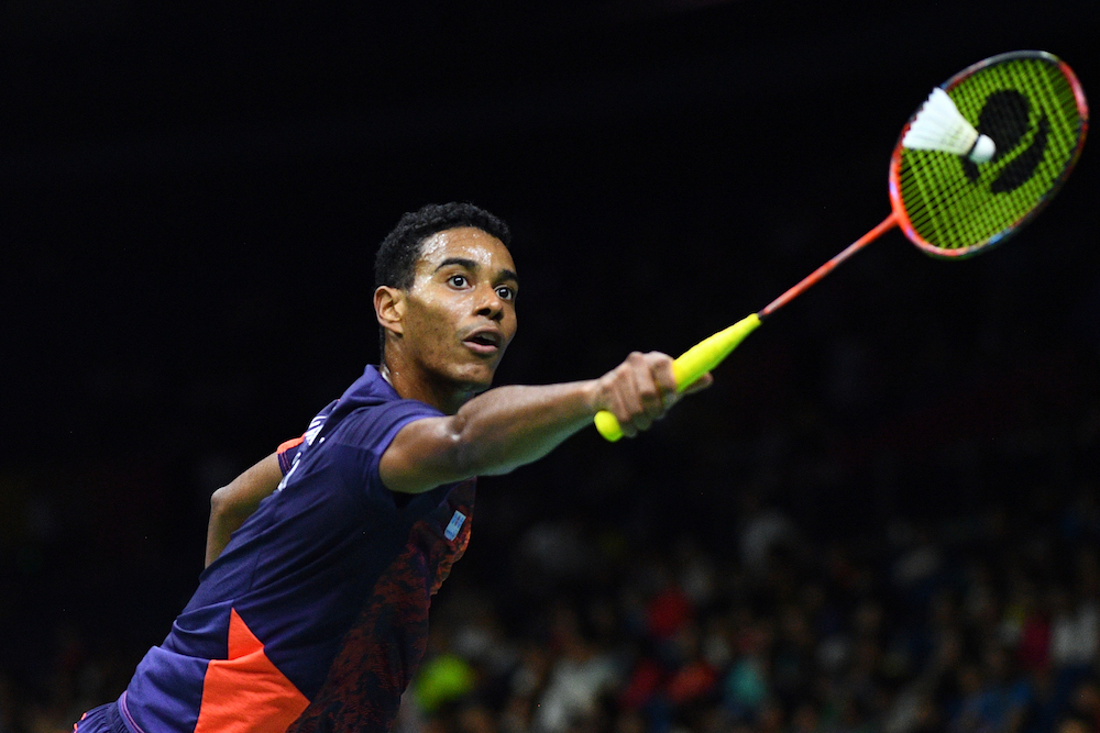 Ygor Coelho of Brazil hits a shot against Chou Tien Chen of Taiwan in their menu00e2u20acu2122s singles match during the badminton World Championships in Nanjing August 2, 2018. u00e2u20acu201d AFP pic