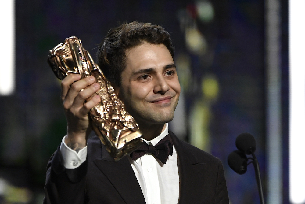 Xavier Dolan poses on stage after receiving the Best Director award for u00e2u20acu02dcItu00e2u20acu2122s Only the End of the Worldu00e2u20acu2122 during the 42nd edition of the Cesar Ceremony in Paris February 24, 2017. u00e2u20acu201d AFP pic