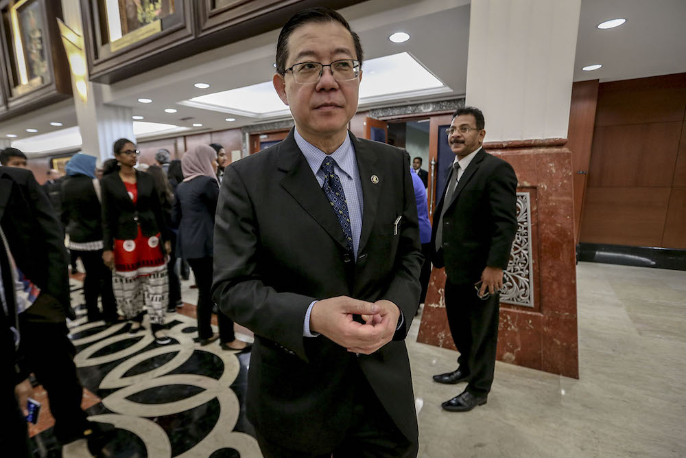 Finance Minister Lim Guan Eng leaves Dewan Rakyat after todayu00e2u20acu2122s Parliamentary session, August 7, 2018. u00e2u20acu201d Picture by Hari Anggara