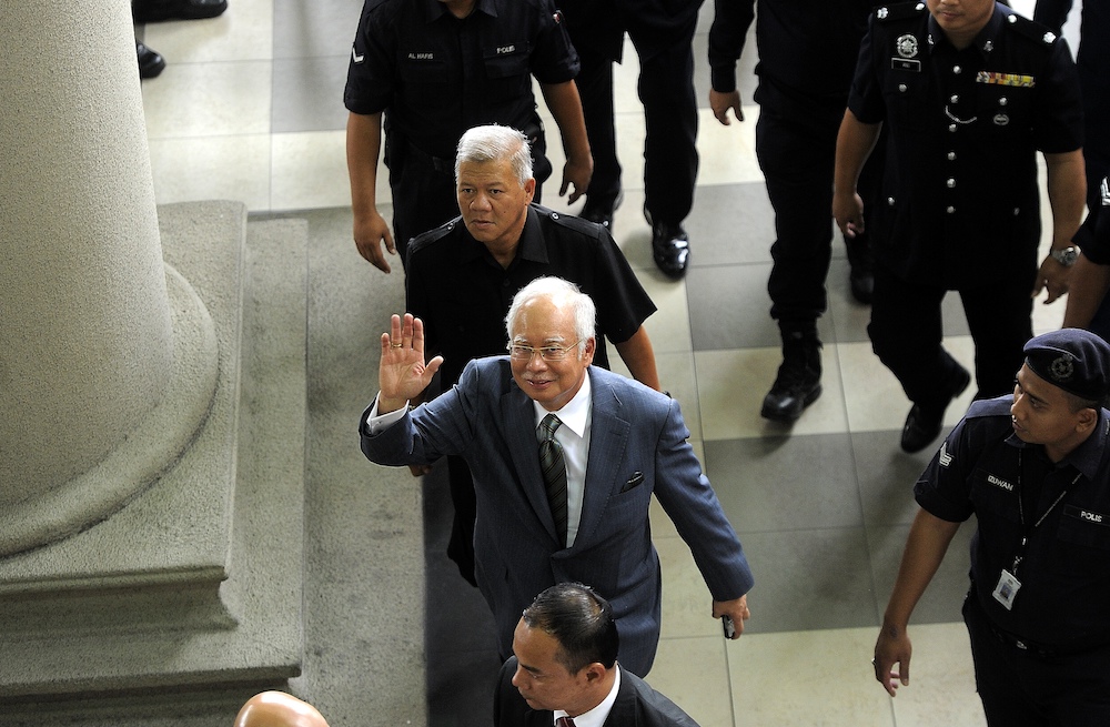 Former prime minister Datuk Seri Najib Razak arrives at the Kuala Lumpur Court Complex, August 8, 2018. u00e2u20acu201d Picture by Shafwan Zaidon