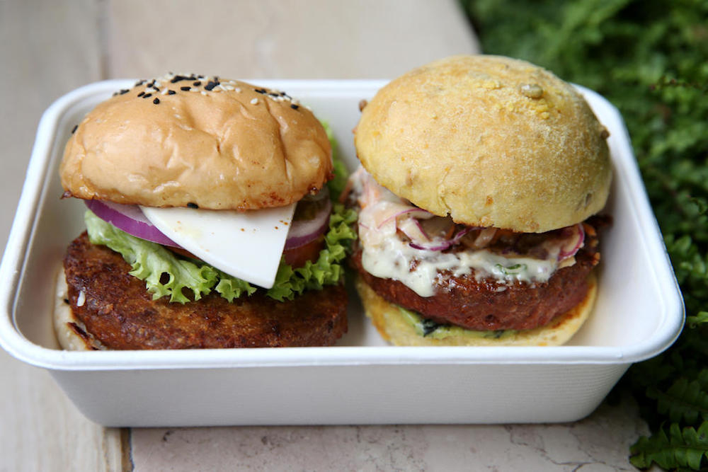 Restaurant mezza9u00e2u20acu2122s Classic Cheese Burger (left) and the Modern Asian Burger with Beyond Burger plant-based patties. u00e2u20acu201d TODAY pic