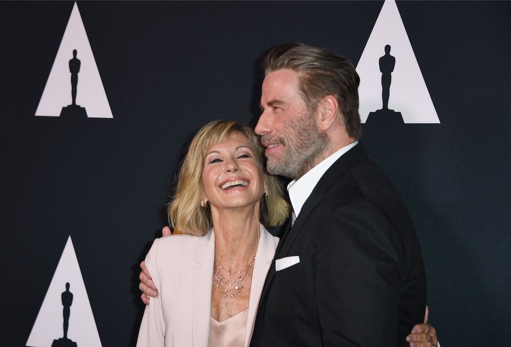 Actors Olivia Newton-John and John Travolta on the red carpet as they arrive for the 40th anniversary celebration of the movie u00e2u20acu02dcGreaseu00e2u20acu2122 at the Academy of Motion Picture Arts and Sciences (AMPAS) in Beverly Hills August 15, 2018. u00e2u20acu201d AFP pic