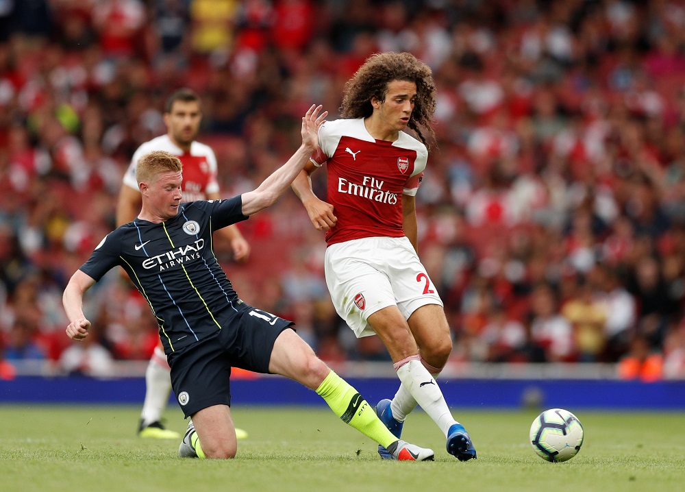 Arsenalu00e2u20acu2122s Matteo Guendouzi in action with Manchester Cityu00e2u20acu2122s Kevin De Bruyne at the Emirates Stadium in London August 12, 2018. u00e2u20acu201d Picture by Action Images via Reuters