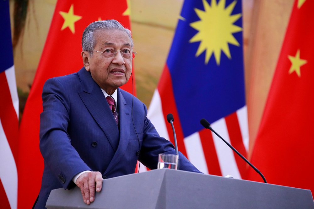 Prime Minister Tun Dr Mahathir Mohamad speaks during a news conference with Chinau00e2u20acu2122s Premier Li Keqiang at the Great Hall of the People in Beijing August 20, 2018. u00e2u20acu201d Reuters pic