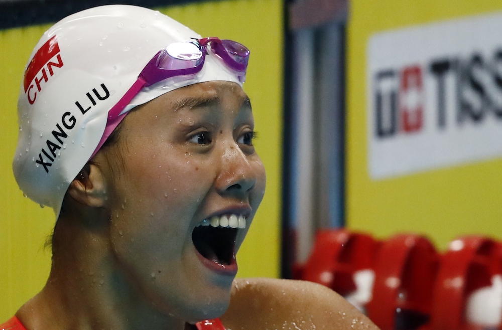 Liu Xiang of China celebrates after setting a new world record in the womenu00e2u20acu2122s 50 metres backstroke at the 2018 Asian Games in Jakarta August 21, 2018. u00e2u20acu201d Reuters pic