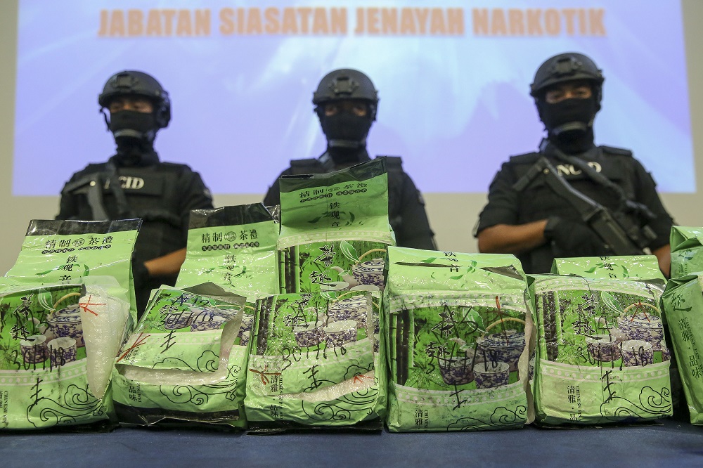 Syabu worth RM1.56 million seized from a syndicate are displayed during a press conference at Bukit Aman in Kuala Lumpur August 1, 2018. 
