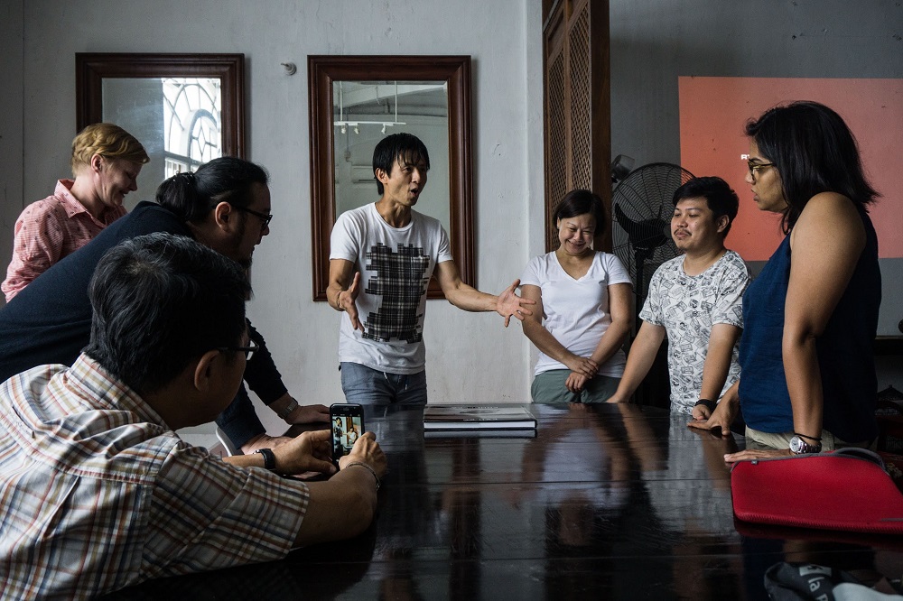 Ian Teh (centre) conducting a workshop at a previous Obscura Festival. u00e2u20acu201d Picture courtesy of Obscura Festival 