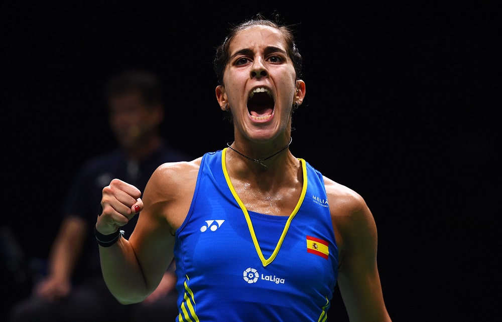 Carolina Marin of Spain reacts after a point against Sindhu Pusarla of India in the women's singles final during the badminton World Championships in Nanjing, Jiangsu province on August 5, 2018. u00e2u20acu201d AFP pic