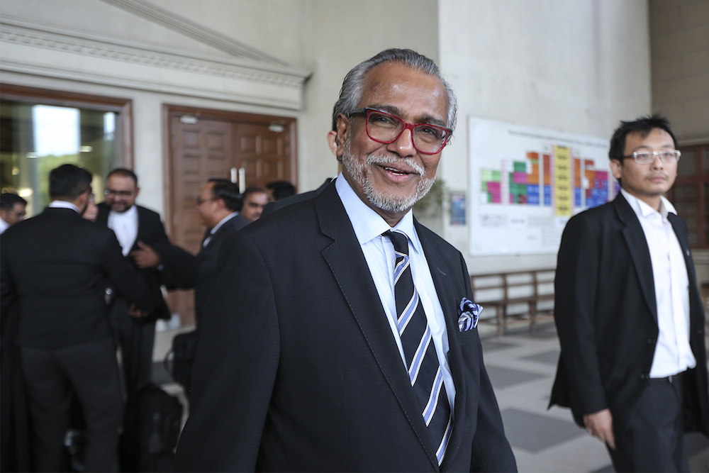 Lawyer Tan Sri Muhammad Shafee Abdullah leaves the High Court in Kuala Lumpur August 10, 2018. u00e2u20acu201d Picture by Azneal Ishak