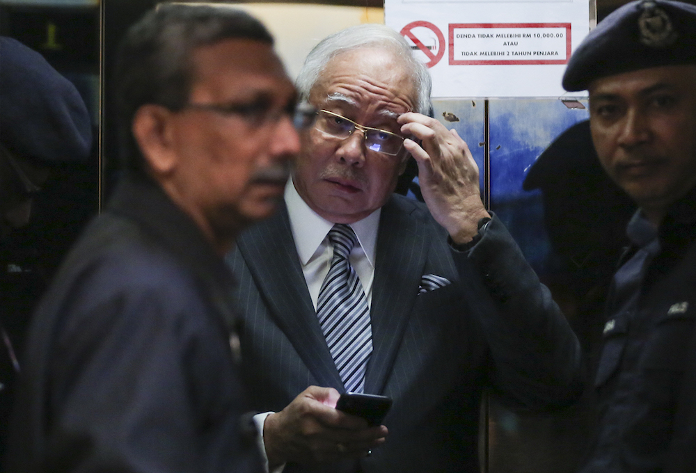 Datuk Seri Najib Razak arrives at the High Court in Kuala Lumpur August 10, 2018. u00e2u20acu201d Picture by Azneal Ishak