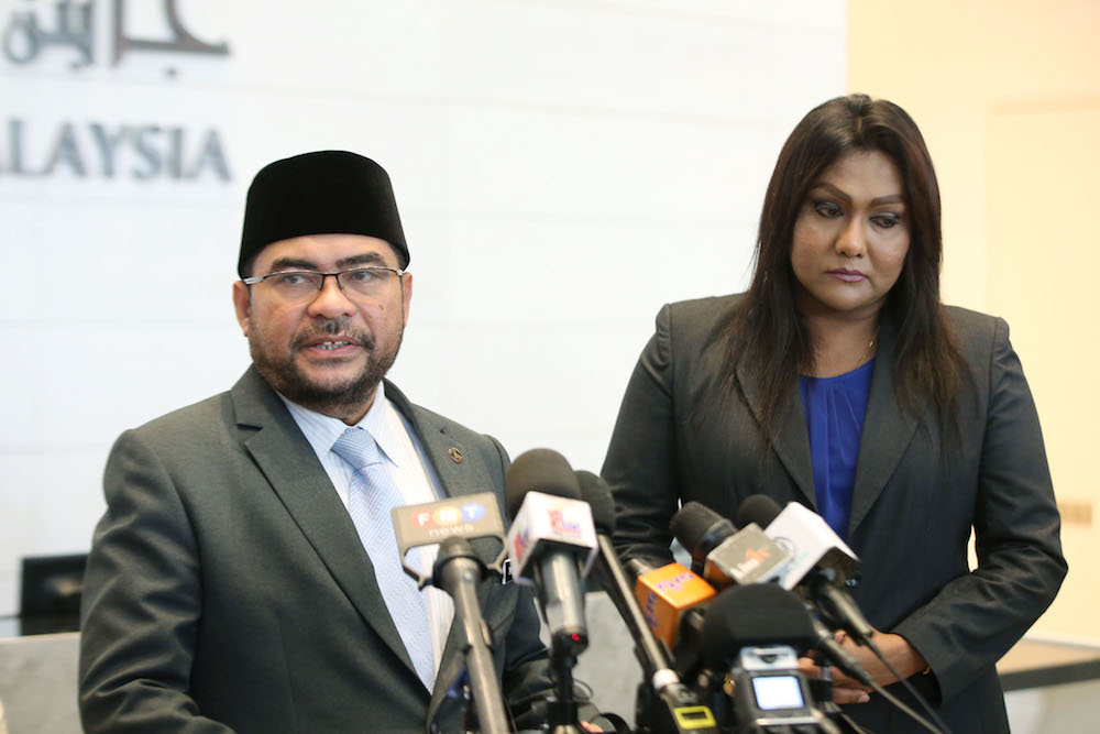 Datuk Mujahid Yusof Rawa and Nisha Ayub attend a press conference in Putrajaya August 10, 2018. u00e2u20acu201d Picture by Azinuddin Ghazali
