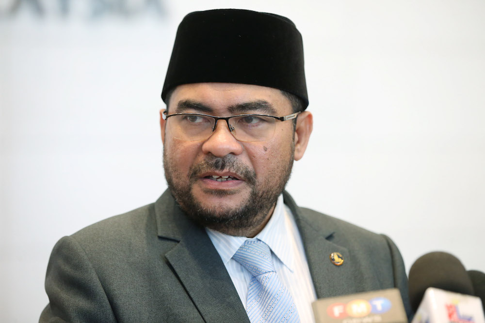 Minister in the Prime Ministeru00e2u20acu2122s Department in charge of Islamic religious affairs Datuk Mujahid Yusof Rawa attends a press conference in Putrajaya August 10, 2018. u00e2u20acu201d Picture by Azinuddin Ghazali