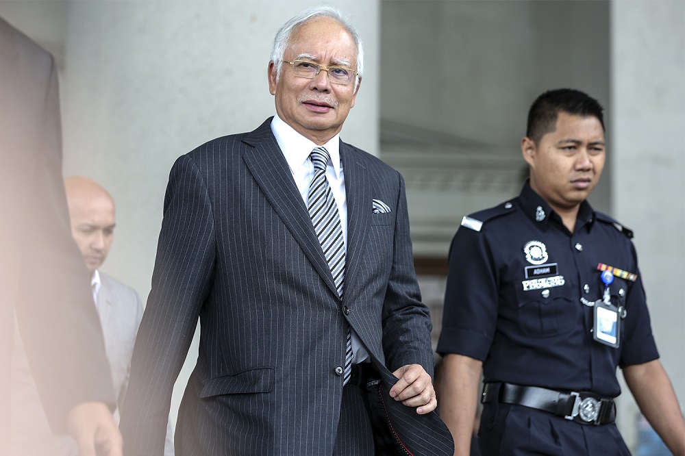Former prime minister Datuk Seri Najib Razak leaves the Kuala Lumpur High Court August 10, 2018. u00e2u20acu201d Picture by Azneal Ishak
