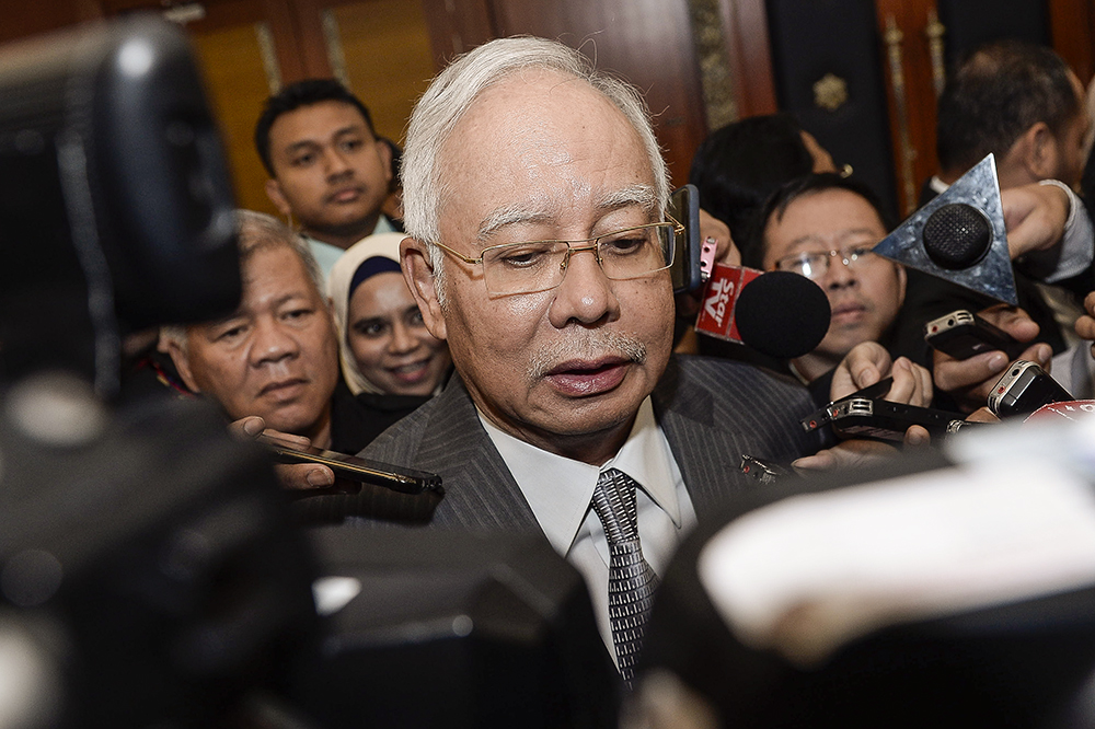 Datuk Seri Najib Razak speaks to reporters at the Parliament in Kuala Lumpur August 13, 2018. u00e2u20acu201d Picture by Miera Zulyana