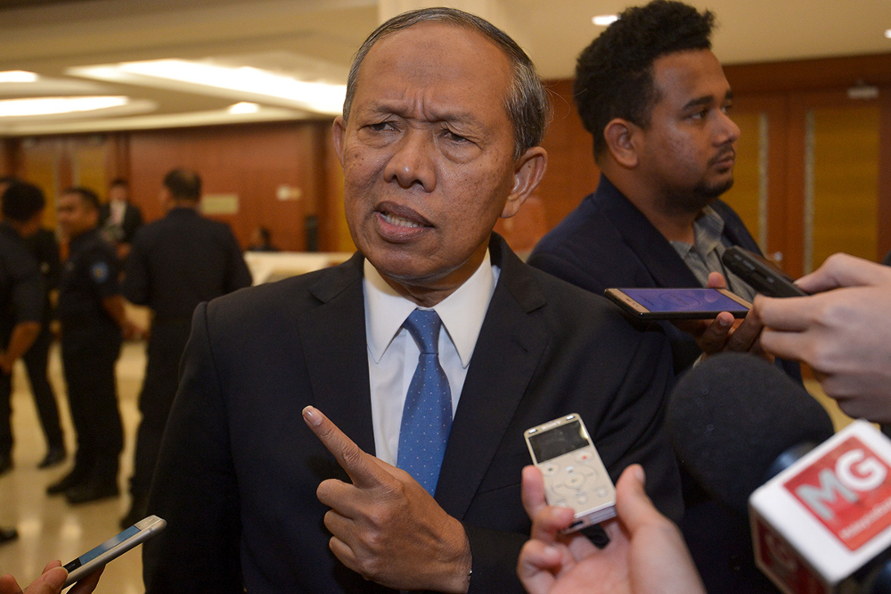 Rompin MP Datuk Seri Hasan Arifin speaks to the media after the Dewan Rakyat session at Parliament in Kuala Lumpur August 16, 2018. u00e2u20acu201d Picture by Mukhriz Hazim