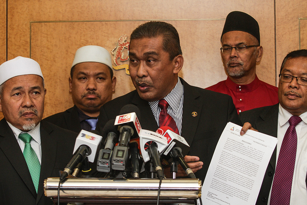 Kota Baru MP Datuk Takiyuddin Hassan during a press conference at Parliament in Kuala Lumpur August 16, 2018. u00e2u20acu201d Picture by Miera Zulyana