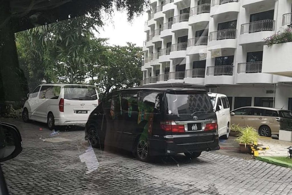 Malaysia-registered vehicles believed to be providing chauffeured services in Singapore are seen at the Festive Hotel and Shangri-Lau00e2u20acu2122s Rasa Sentosa Resort and Spa on Sentosa island. u00e2u20acu201d TODAY pic