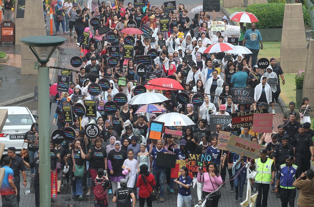 Around 200 people rallied against child marriages, in Bandar Sunway August 18 2018. u00e2u20acu201d Picture by Abdul Razak Ghazali  