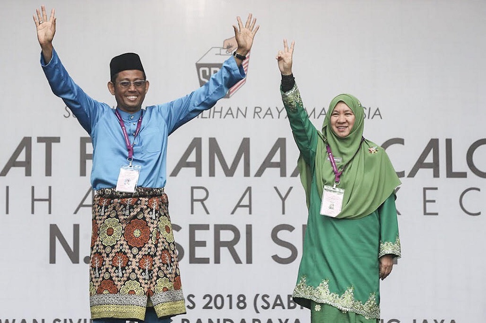 Pakatan Harapanu00e2u20acu2122s Halimey Abu Bakar (left) and PASu00e2u20acu2122 Dr Halimah Ali, at the nomination centre in MBPJ Civic Centre in Petaling Jaya August 18, 2018. u00e2u20acu201dPicture by Hari Anggara